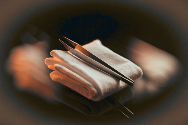 Inspection gloves and tweezers