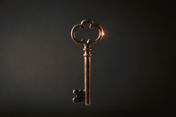 An antique brass key